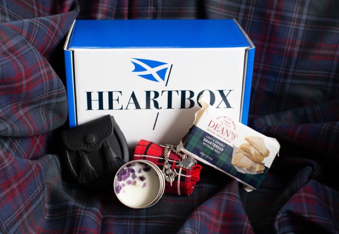 A Highland Fling Heartbox with a mini sporran and amethyst candle